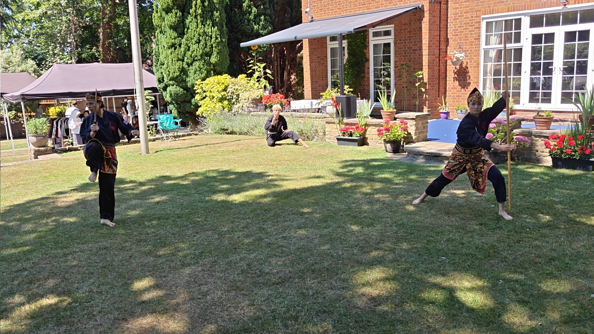 PSF UK athletes performing Pencak Silat at the Anglo-Indonesian Society picnic — Wisma Nusantara, London, July 2026