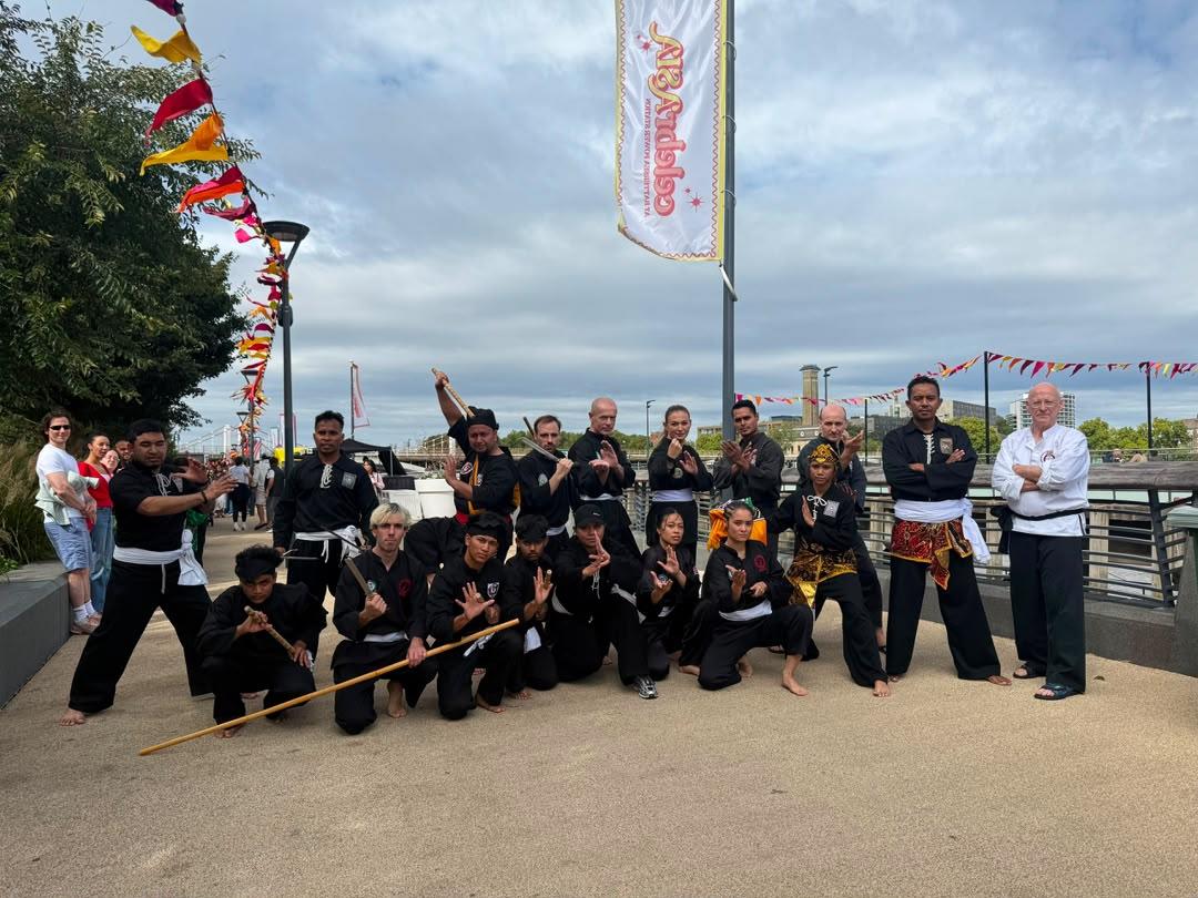 Performers from Gerak Ilham, Silat Seni Gayong UK, PSHT UK and Kuntao Matjan on the riverside at Battersea Power Station — CelebrAsia, September 2026